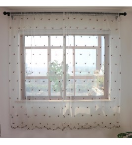 White tulle curtains with small red flower embroidery